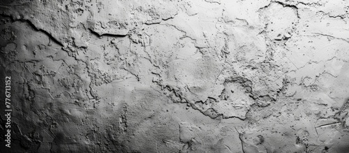 A close up of a wall with a white paint on it