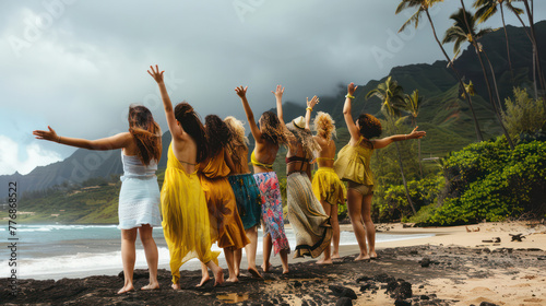 A group of women are standing on a beach, some of them wearing yellow dresses Celebrating Women's Innovation