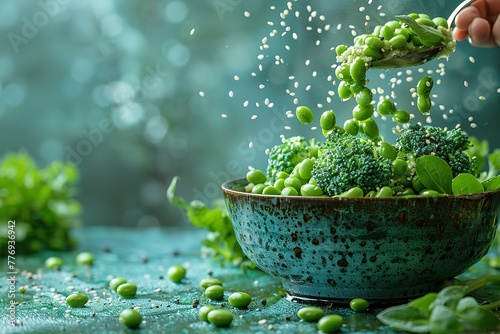 A bowl of green vegetables, including broccoli and peas
