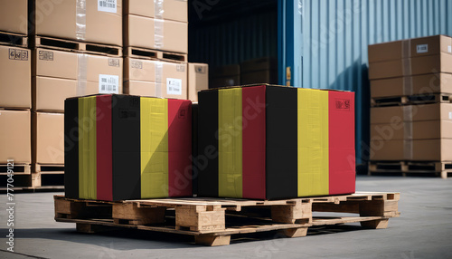 Stacked cardboard boxes and a Belgium flag on a pallet, representing international trade