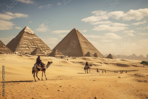 Visitors riding horses around the pyramids.