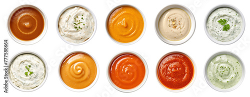 Variety of different dipping sauces in small bowls, view from above, isolated on a transparent background