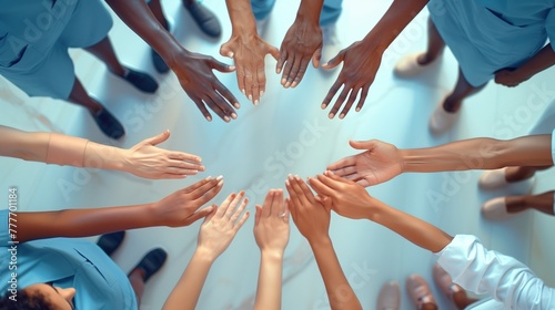 A circle of healing hands: An aerial view capturing a multiethnic medical team's hands together, forming a circle of unity and shared purpose