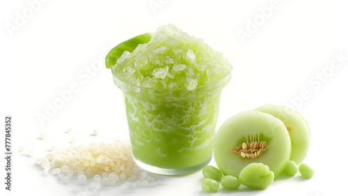 Green slush in a cup with tapioca pearls, next to sliced honeydew and melon balls.