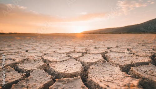 dry soil cracks showcasing lack of water and the effect of global warming on earth
