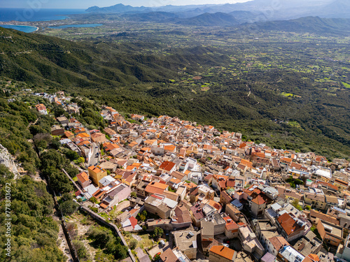 Picturesque village in the mountains of Baunei in Italy, in the region of Sardinia, in the province of Nuoro, aerial view from drone