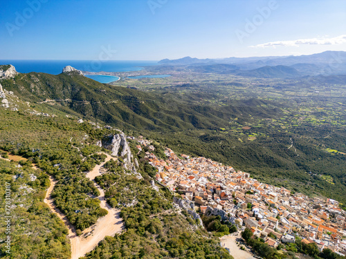 Picturesque village in the mountains of Baunei in Italy, in the region of Sardinia, in the province of Nuoro, aerial view from drone