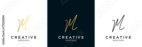 M handwritten logo with circle paint brush design vector.