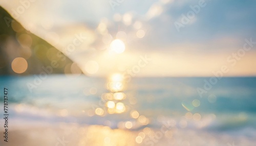 beautiful blur defocused blue sea background with sun rays and bokeh landscape of tropical summer summer vacation concept