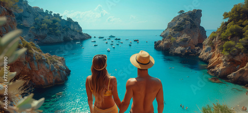 Couple on a summer vacation trip observing beautiful views of the Mediterranean Sea. Europe tourism and travel concept