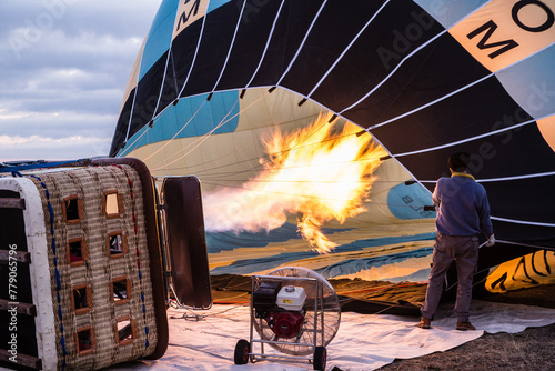 Goreme, Turkey - March 24 2014: A hot air balloon is being aerated before taking off