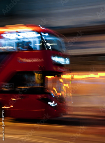 fast moving Red bus