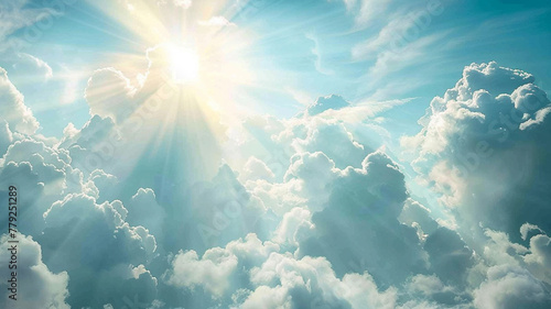 The sun peeking out from behind fluffy white clouds, casting rays of light across the sky.