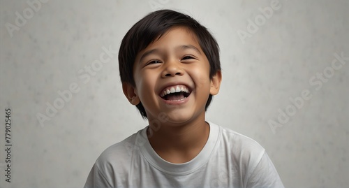 young filipino child boy on plain bright white background laughing hysterically looking at camera background banner template ad marketing concept from Generative AI