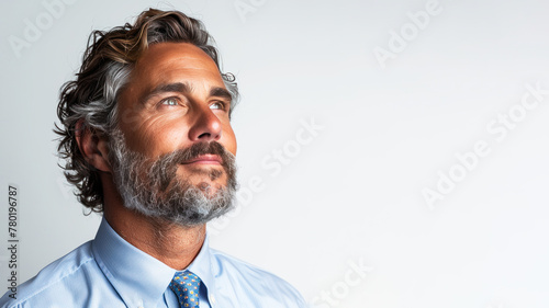 Side view portrait of senior caucasian businessman looking at the future