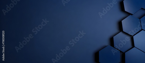 Dark blue background featuring various hexagonal shapes creating a geometric pattern
