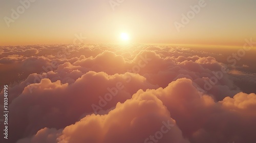 A beautiful sunset over a sea of clouds. The warm colors of the sky and the clouds create a peaceful and serene scene.