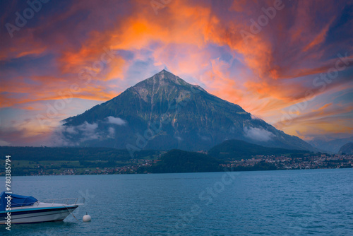 Aeiral panorama of Niesen mountain, also called as Swiss Pyramid with reflection on the Thun lake