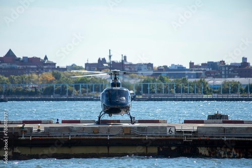 Black helicopter on a heliport in Manhattan, New York city