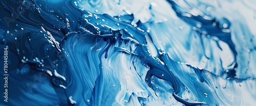 Abstract paint strokes in a liquid blue palette, forming an elegant and dynamic backdrop.