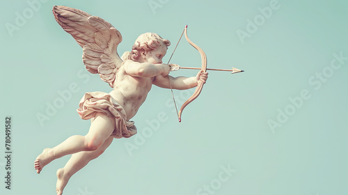 Cupid flying overhead shooting his arrow on pastel blue background