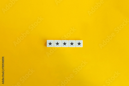5 Stars Banner. Excellency, Rating, Review, First Class, First Rate, Superior, Top-notch Concept. Letter Tiles on Yellow Background. Minimalist Aesthetics.