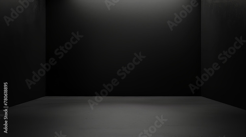 A captivating image of a pitch-black space with the floor subtly catching some light creating a mysterious aura
