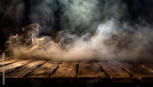 fog in darkness abstract defocused smoke on wooden table halloween backdrop