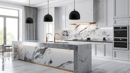 A luxury white kitchen with black pendant lights hanging above a waterfall granite island stainless steel appliances and gold hardware and faucet