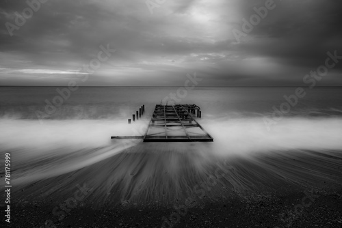 horizontal line and long exposure shoot on the beach as black and white