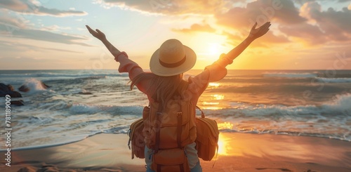 A happy woman traveler with arms raised in joy Back view of happy excited raising arms up to blue sky - Hipster enjoying summer sunset at the beach - Travel, mental health, success, business, tourism