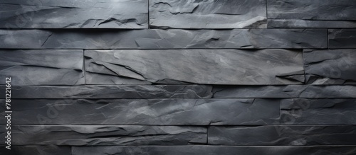 Black stone wall with dark backdrop