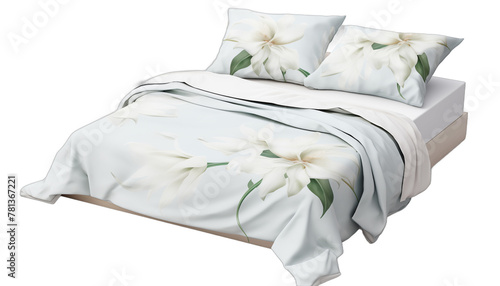 White bedding with a floral pattern of lilies The duvet cover and two pillows are isolated on a white background