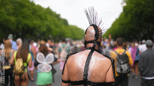 Fancy guy wear bdsm role play game costume. Shiny dressed up fetishist coming out. Fun lgbt gay pride carnival. Old bi man celebrate csd fest day. Cool wierd person walk fetish parade Crazy freak show