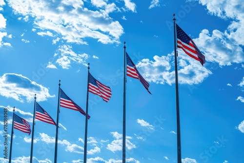 American flags against the blue sky