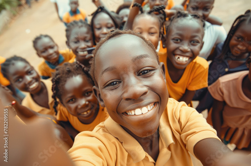 a group of smiling african school children taking selfie in the streets, nigerian village