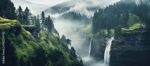 Waterfall amidst mountain with forest backdrop