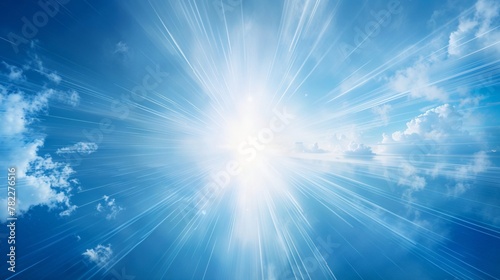 Brilliant sunburst with lens flare against a blue sky during midday, god rays piercing through wisps of clouds, creating a powerful lens flare effect. The clear sky radiates with shades of blue