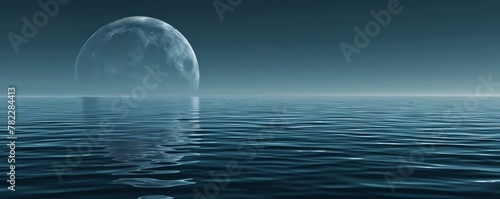 Surreal moonrise over tranquil ocean