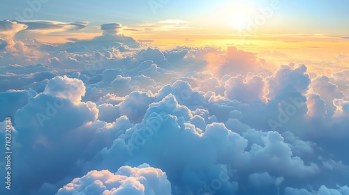 Amazing view above the clouds. The soft sunlight illuminates the fluffy clouds, creating a beautiful and peaceful scene.