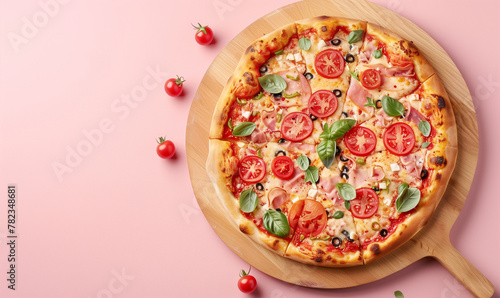 pizza on the wooden board, top view, on pastel pink background