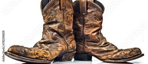 worn cowboy boots with distressed soles