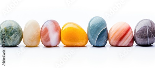 Colorful array of stones on white base
