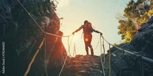 rock climbing with ropes, bridges at the top of mountains