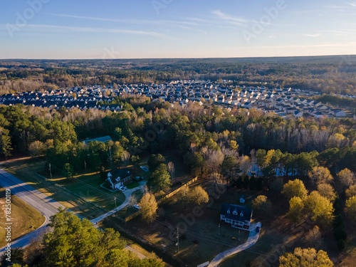 Aerial sunset landscape of suburban neighborhood Euchee Creek Trails in Grovetown Augusta Georgia