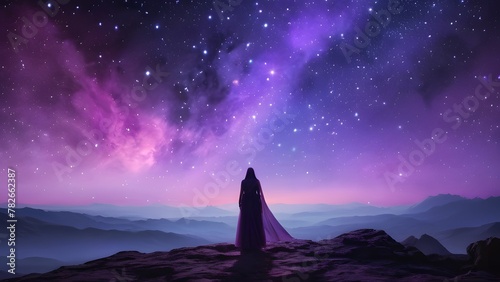 Silhouette of woman with back to purple milky way space sky
