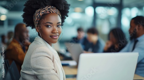 A smart and confident African American woman sitting at a table in a business meeting. Fictional Character Created by Generative AI.