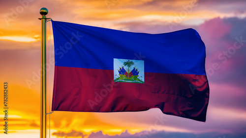 Haiti Waving Flag Against a Cloudy Sky at Sunset.