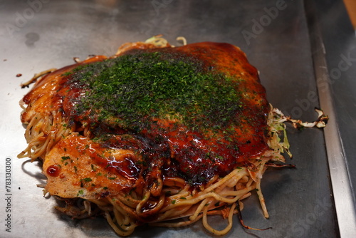 Okonomiyaki in Osaka, Japan - 大阪 名物 お好み焼き 