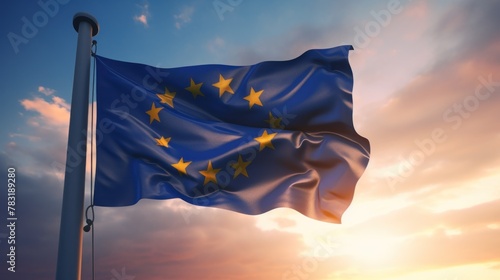 The European Union flag flutters against the blue sky at sunset, banner